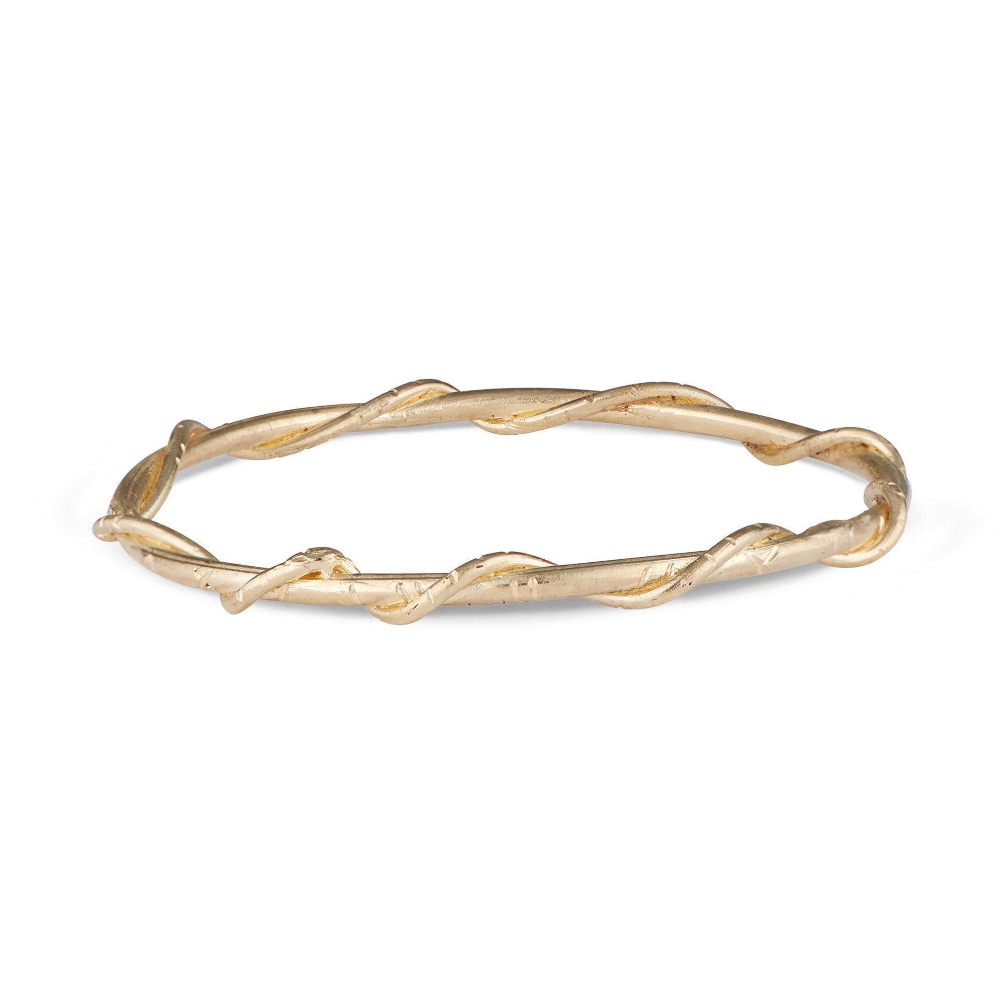 The Natalie McMillan 14k Gold Marina Bangle is a beautiful sculpturesque piece of jewelry that is sure to be on your wrist for years to come.