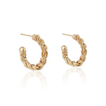 Load image into Gallery viewer, These solid 14K Yellow Zeppelin Gold Hoops feature 14k Gold posts and earnuts and are safe for sensitive ears. Their twisted design gives them the appearance of being heavy, while actually being lightweight. In true Natalie McMillan fashion, there are tiny etching details throughout. 
